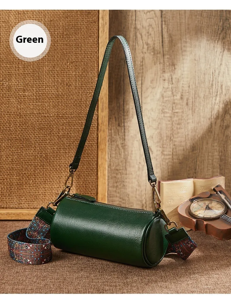 Top layer cowhide leather round single-shoulder bag in caramel brown with wide strap and sewing thread details