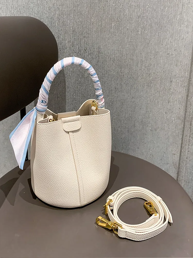 PU leather casual handbag for women with bow detail in golden brown