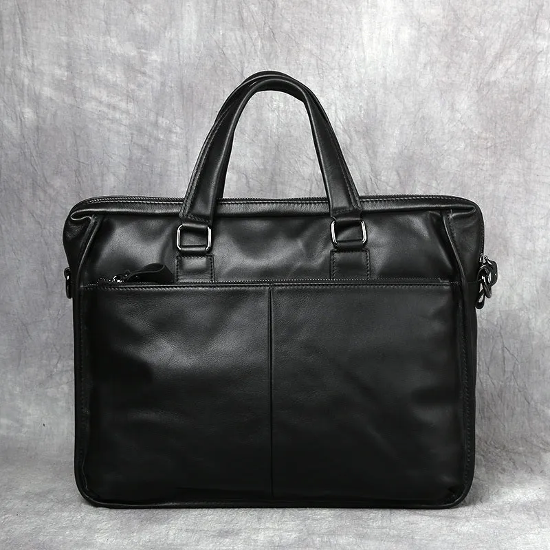 Black men's leather leisure briefcase with top layer cow hide, zipper closure, and shoulder strap