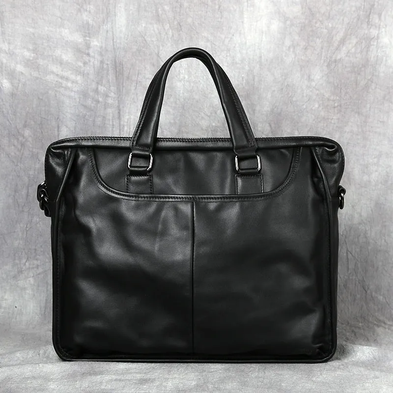 Black men's leather leisure briefcase with top layer cow hide, zipper closure, and shoulder strap