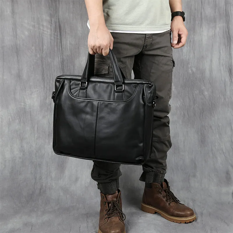 Black men's leather leisure briefcase with top layer cow hide, zipper closure, and shoulder strap