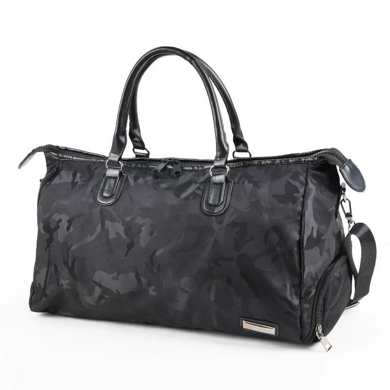 Nylon travel bag in black with soft handle, top zipper, and multiple internal pockets