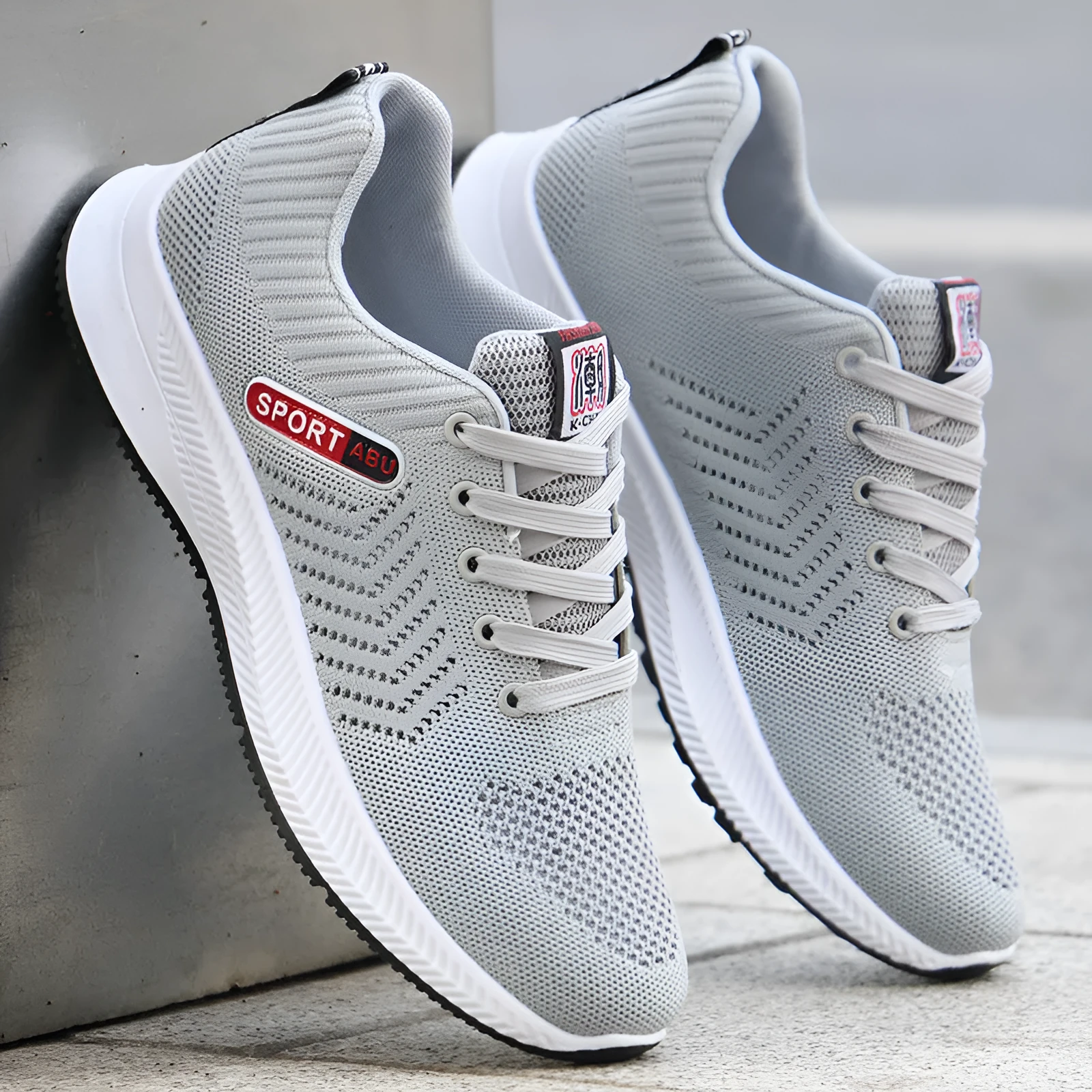 Men's breathable mesh casual sports shoes with black grey fabric upper rubber sole lace-up flat heel side view