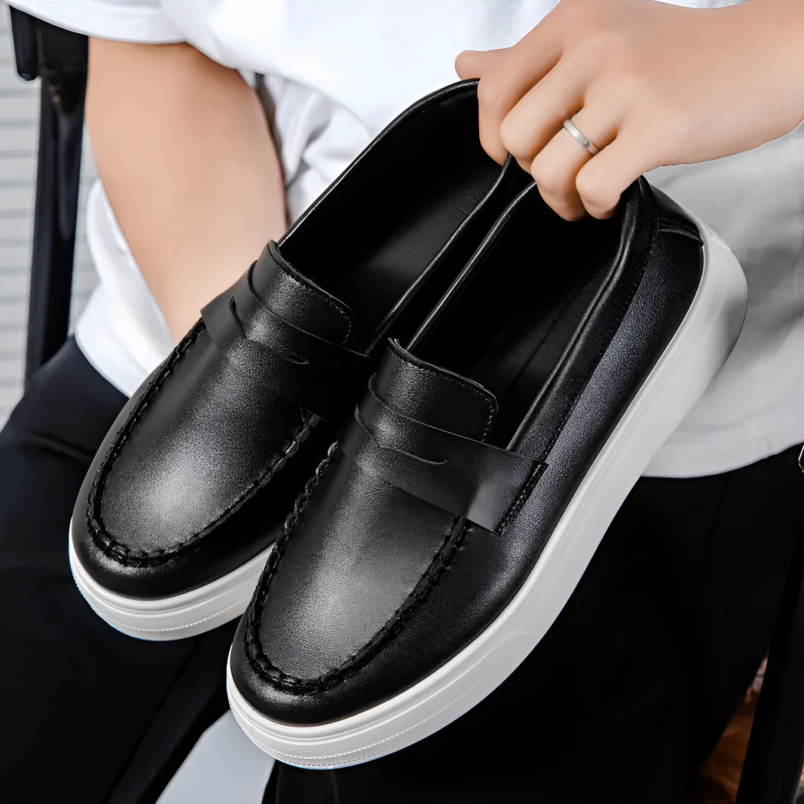 Men's round toe casual shoes in white, black and white, and khaki colours, showing the PU leather upper and oversleeve design.