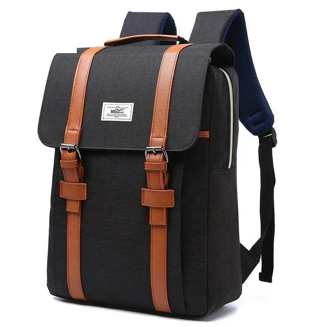 Canvas computer backpack in nylon waterproof cloth with 40x29x12cm dimensions, front view, black colour option, lightweight sports fashion design.