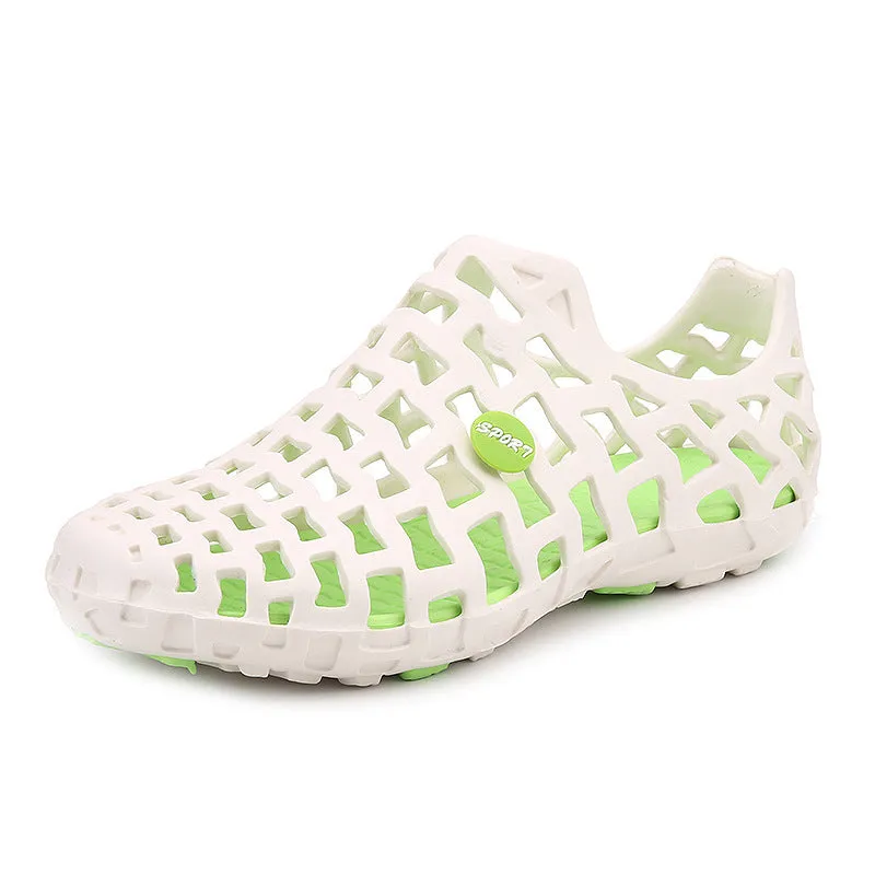 Women's beach footwear in solid colour with EVA upper, rubber sole, round toe, and flat heel on sand