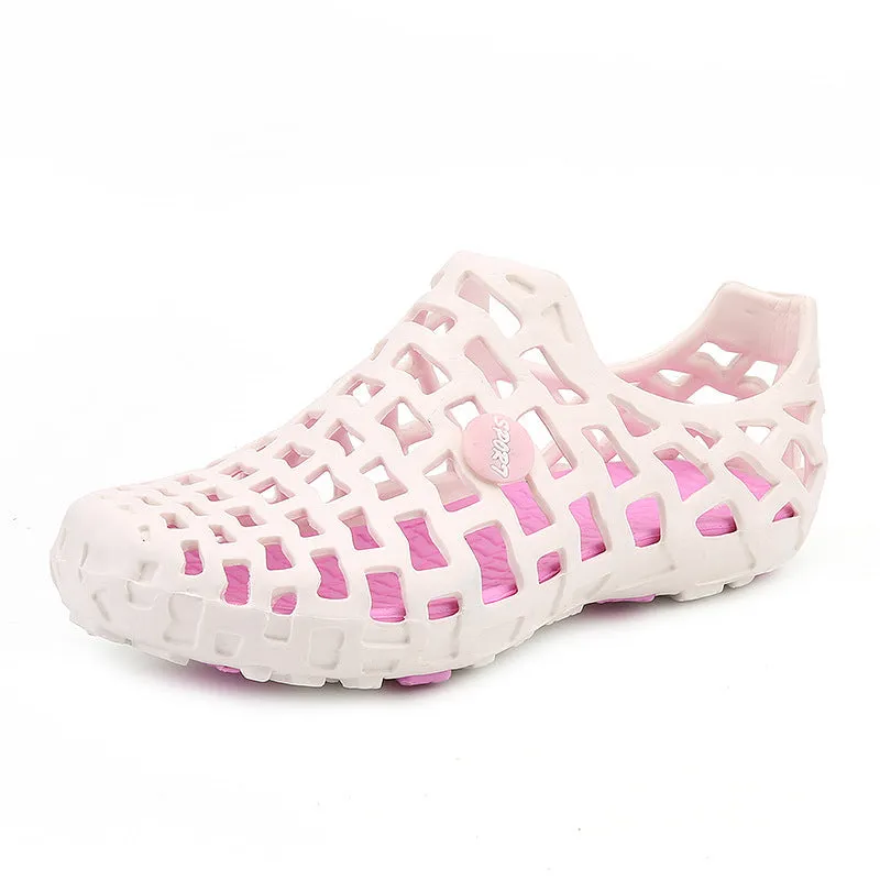 Women's beach footwear in solid colour with EVA upper, rubber sole, round toe, and flat heel on sand