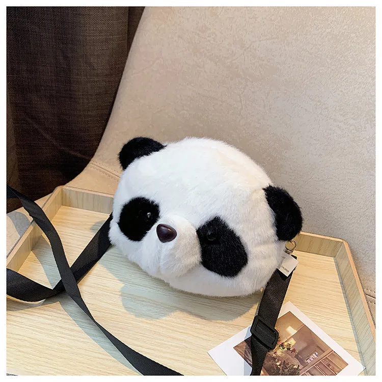 Soft plush panda head crossbody bag with cylindrical shape and outer pocket.