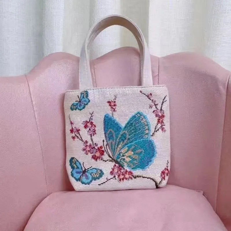 Canvas tote bag with gold wire embroidery in Bunny pattern, showing double-sided stitching detail