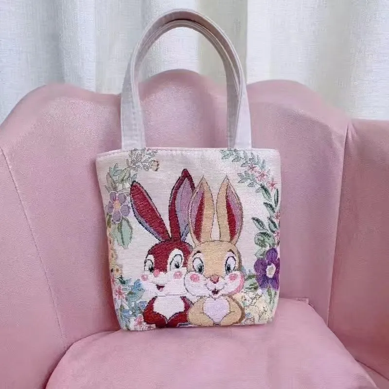 Canvas tote bag with gold wire embroidery in Bunny pattern, showing double-sided stitching detail