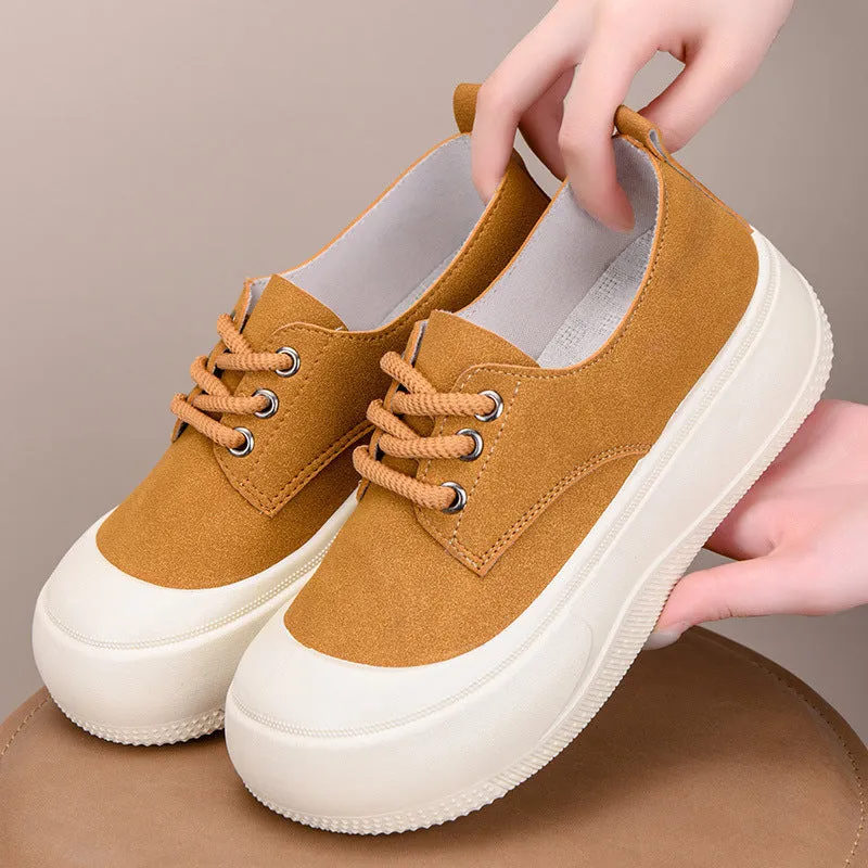Women's camel suede platform loafers with round toe and front lace-up closure on flat rubber sole