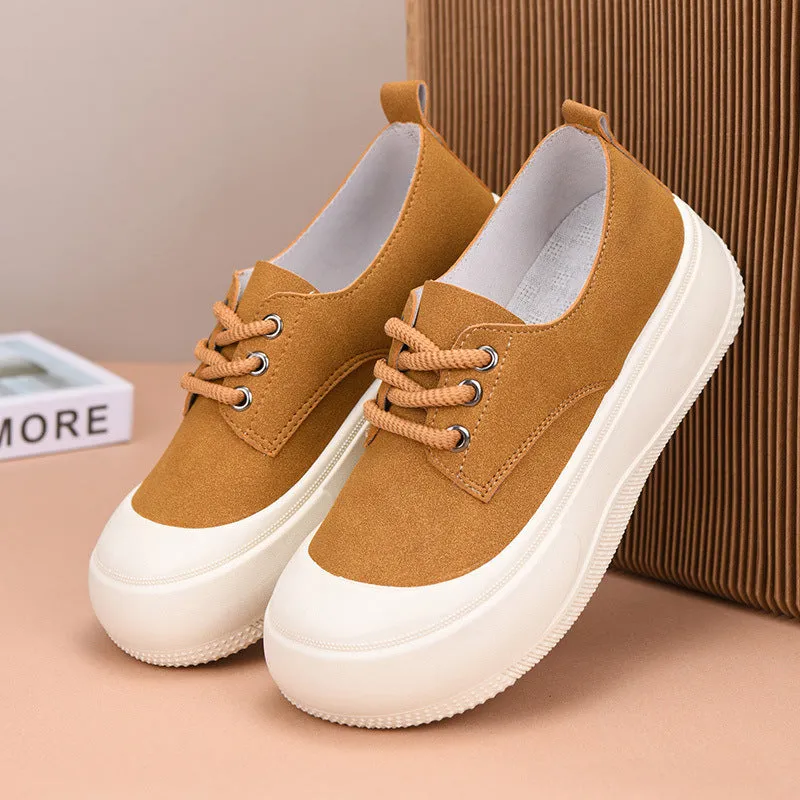Women's camel suede platform loafers with round toe and front lace-up closure on flat rubber sole