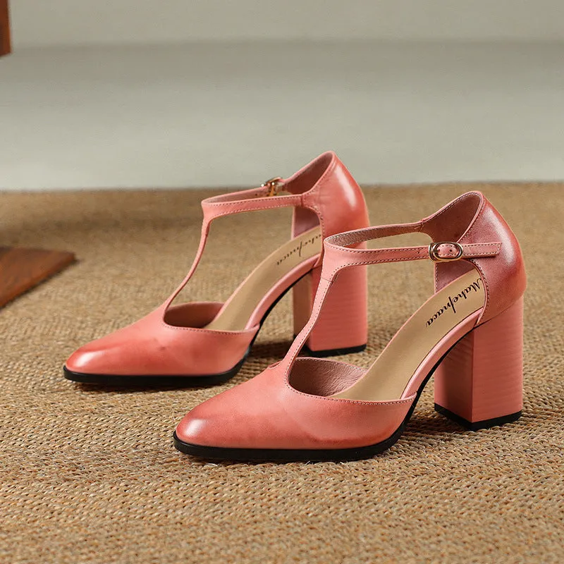Women's pink and dark brown retro Mary Jane shoes with a pointed toe, buckle, and hollow design detail.
