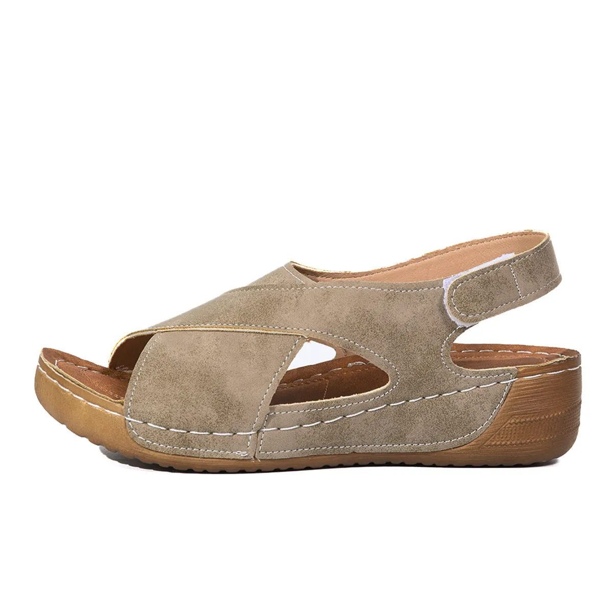Roman platform sandals with ankle skirt and adjustable Velcro straps in a khaki colour.
