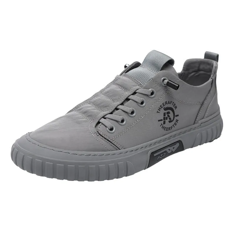 Men's breathable canvas casual shoes in black with round toe, flat rubber sole, and lace-up closure
