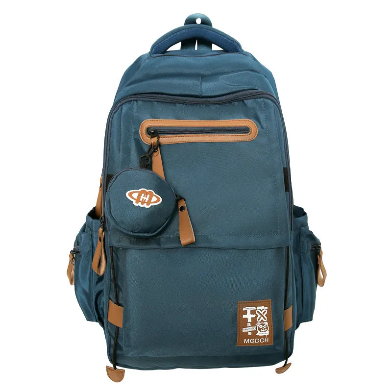 Large-capacity nylon school backpack for middle school students with curved shoulder straps in multiple colour options