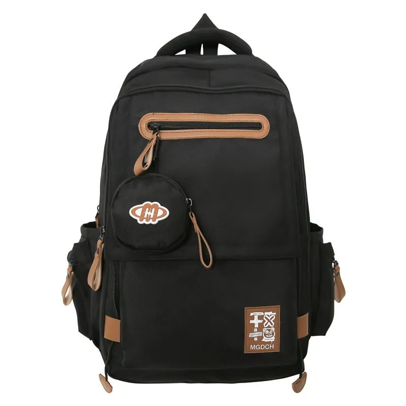 Large-capacity nylon school backpack for middle school students with curved shoulder straps in multiple colour options