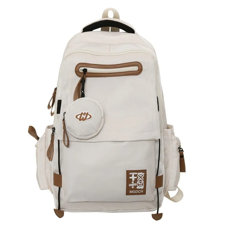 Large-capacity nylon school backpack for middle school students with curved shoulder straps in multiple colour options