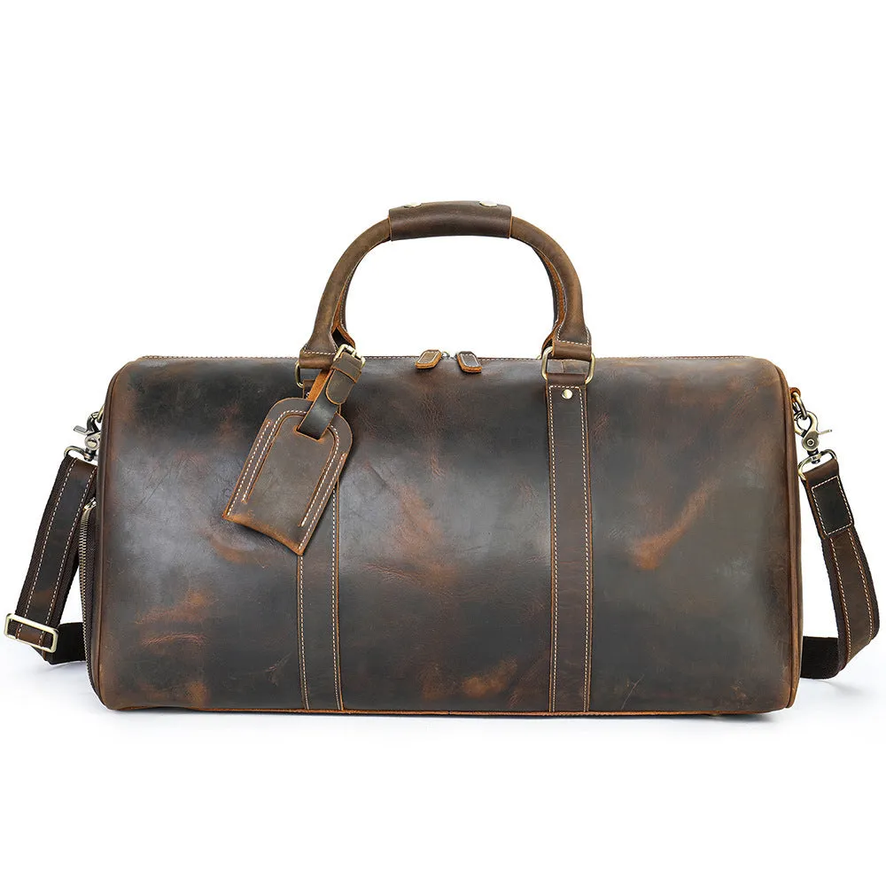 Men's genuine leather large capacity travel bag in brown with fold-over design and metal buckle