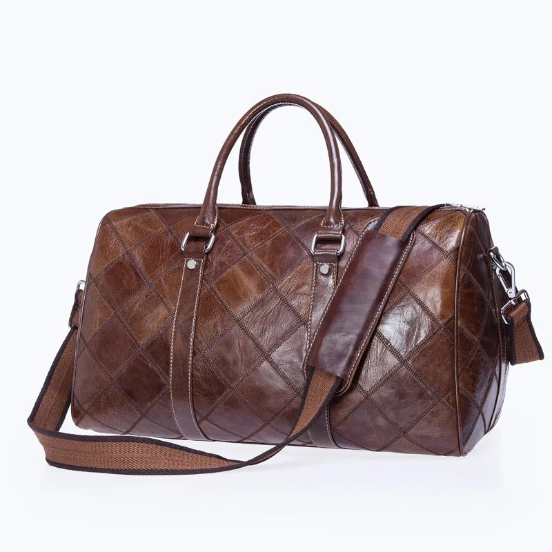 Men's genuine leather large capacity travel bag in brown with fold-over design and metal buckle
