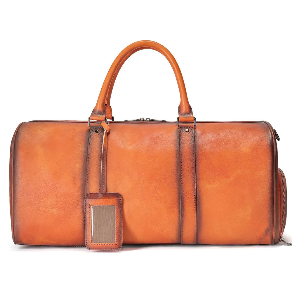 Men's genuine leather large capacity travel bag in brown with fold-over design and metal buckle