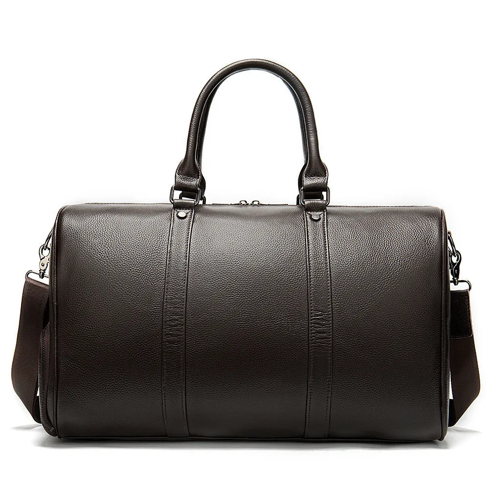 Men's genuine leather large capacity travel bag in brown with fold-over design and metal buckle