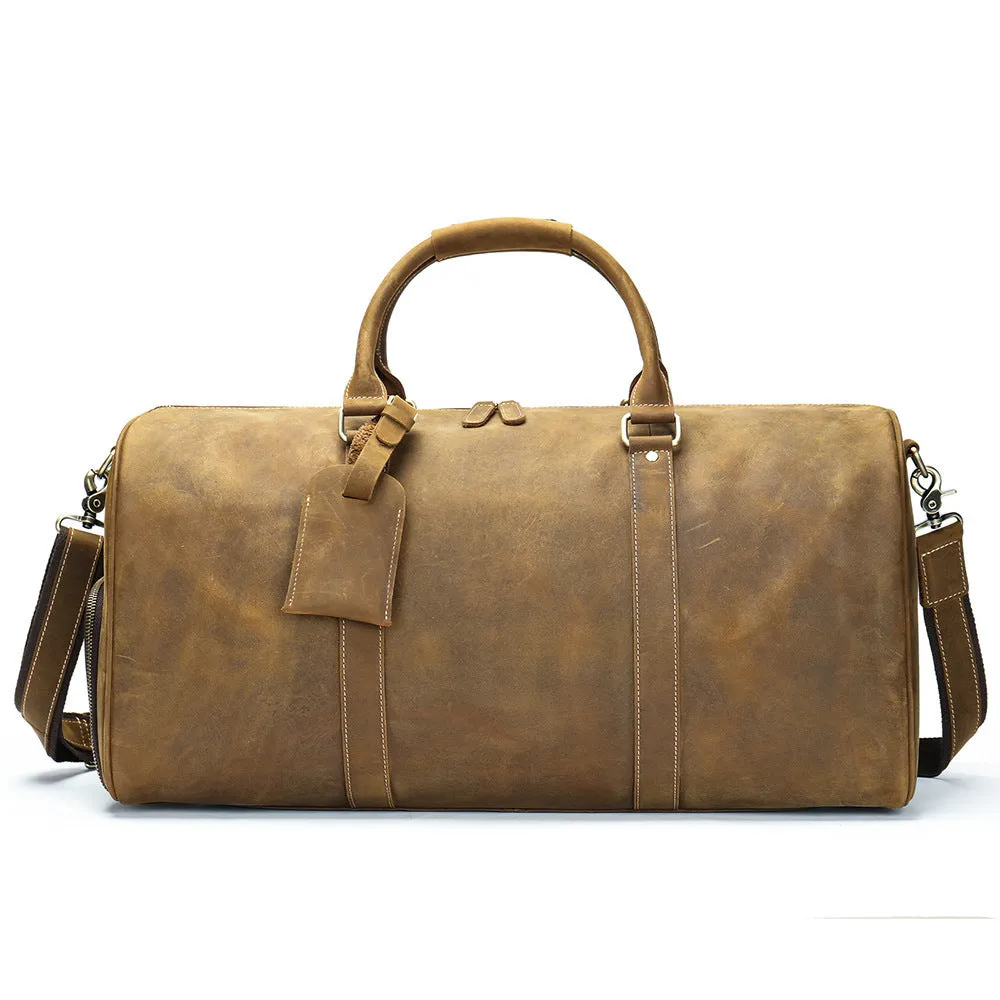Men's genuine leather large capacity travel bag in brown with fold-over design and metal buckle