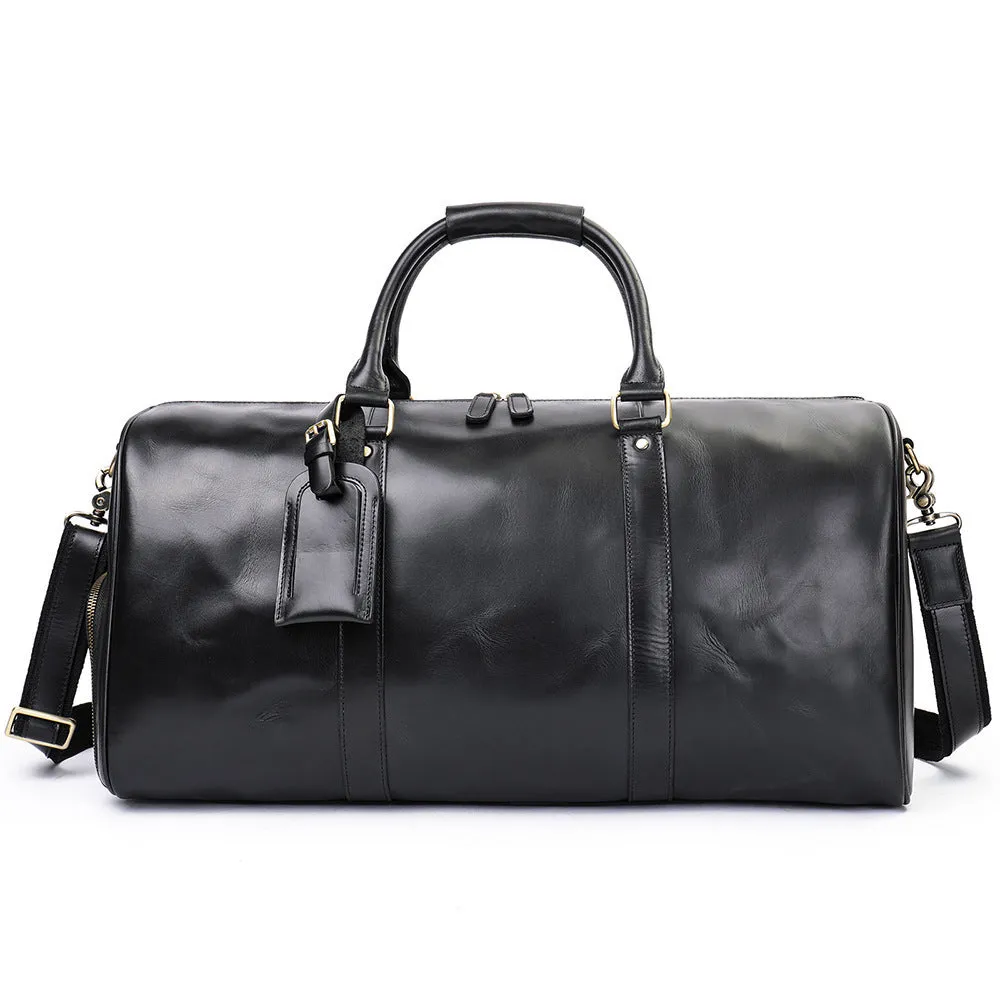 Men's genuine leather large capacity travel bag in brown with fold-over design and metal buckle