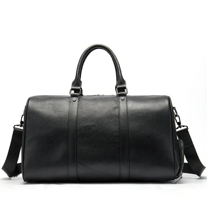 Men's genuine leather large capacity travel bag in brown with fold-over design and metal buckle
