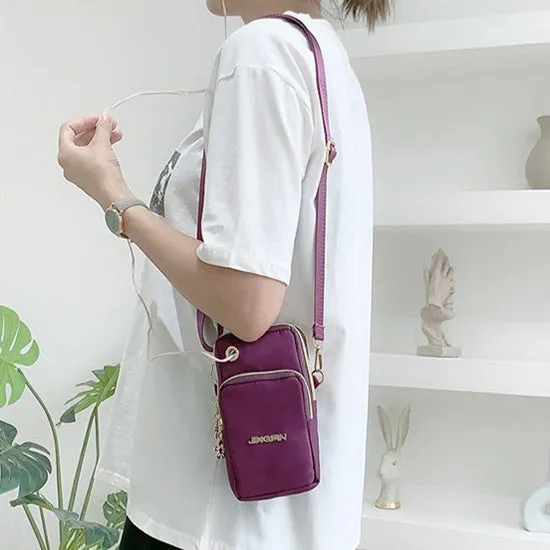 Nylon crossbody mobile phone bag with three zippered layers, card slots, and an adjustable strap in black