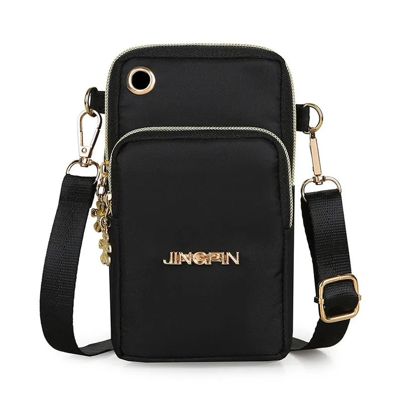 Nylon crossbody mobile phone bag with three zippered layers, card slots, and an adjustable strap in black