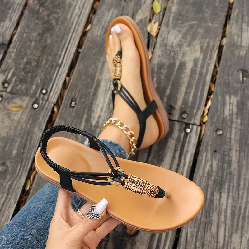 New women's flat sandals in beige with PU upper and hollow design