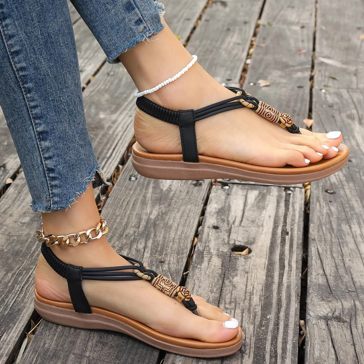New women's flat sandals in beige with PU upper and hollow design