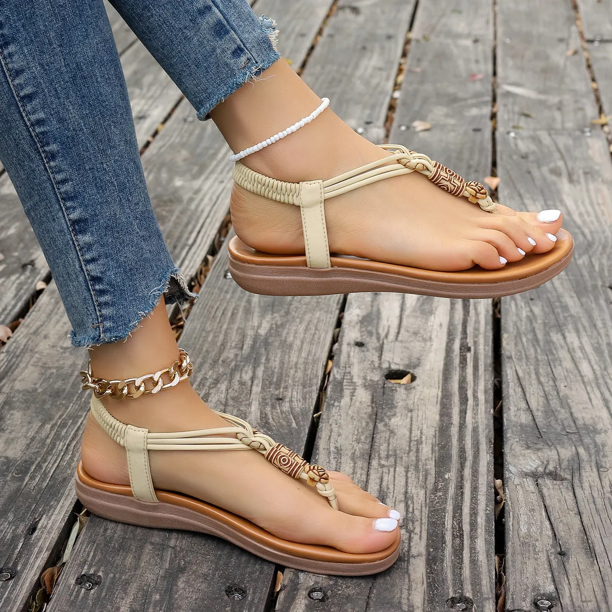 New women's flat sandals in beige with PU upper and hollow design