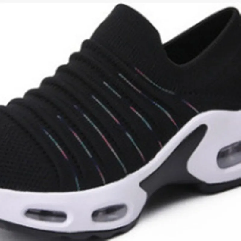 Plus size women's fly-knit socks shoes in light gray with mesh upper and low heel.