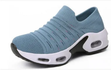 Plus size women's fly-knit socks shoes in light gray with mesh upper and low heel.
