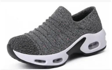 Plus size women's fly-knit socks shoes in light gray with mesh upper and low heel.