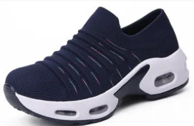 Plus size women's fly-knit socks shoes in light gray with mesh upper and low heel.