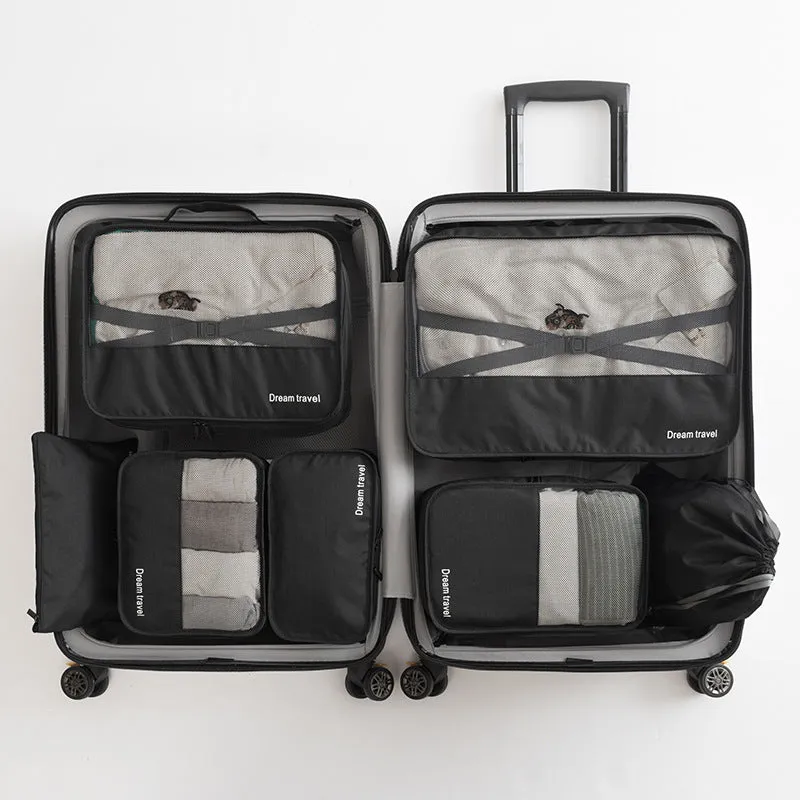 Set of 7 waterproof nylon travel tote bags in black, gray, dark blue, blue, and orange showing different sizes