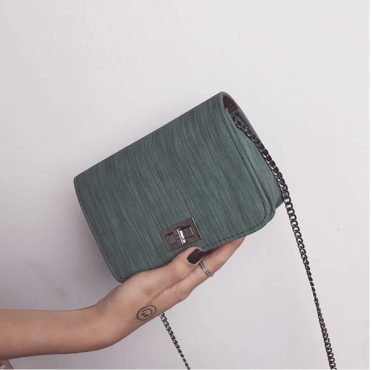 Fashion backpack in pure colour PU material, available in black, green, and pink