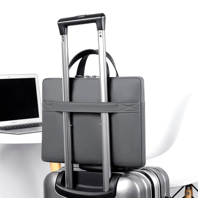 Ultra-thin leather laptop case in light grey with zipper closure and soft handle for 14 inch devices