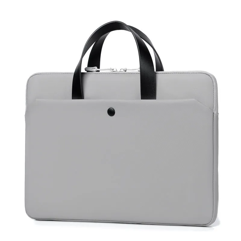 Ultra-thin leather laptop case in light grey with zipper closure and soft handle for 14 inch devices