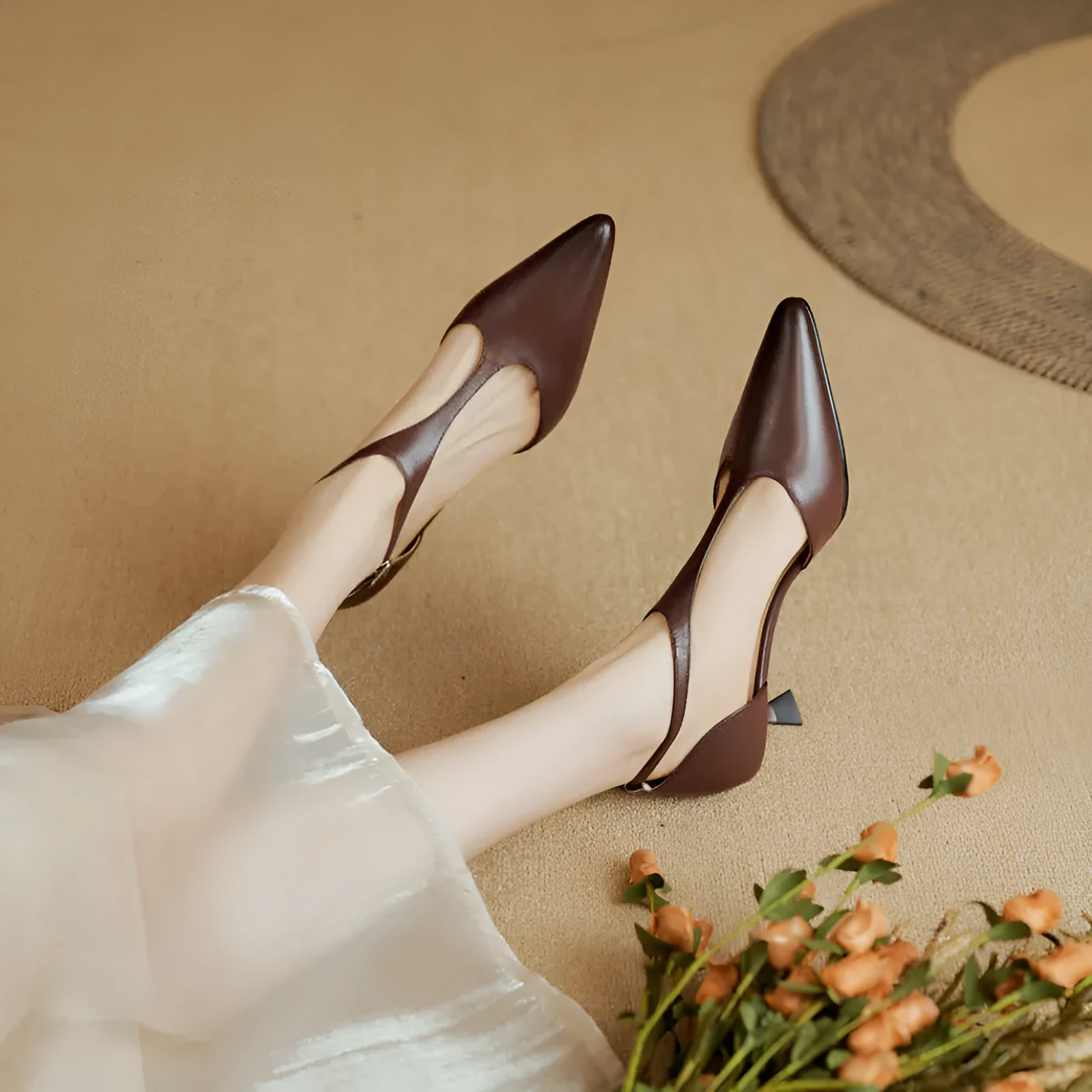 Women's cowhide leather high heels with pointed toe in black or brown colour