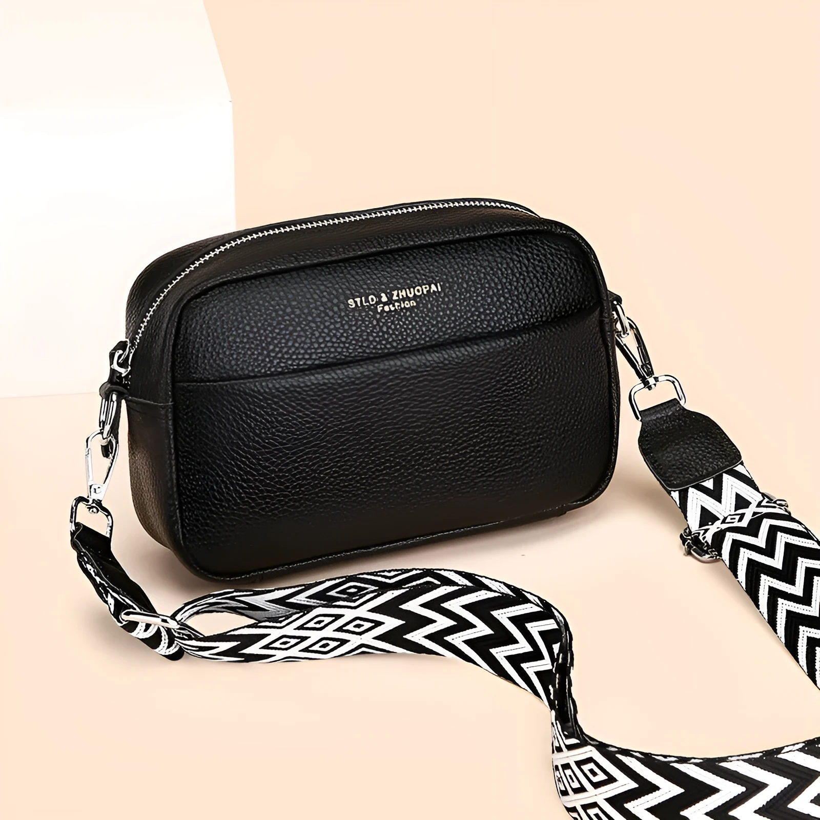 Genuine leather small square shoulder messenger bag in black with adjustable strap and top layer cowhide finish