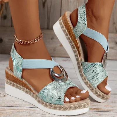 Women's peep toe serpentine wedge sandals, PU upper, in dark brown, shown on foot