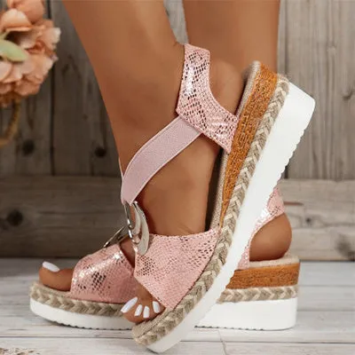Women's peep toe serpentine wedge sandals, PU upper, in dark brown, shown on foot