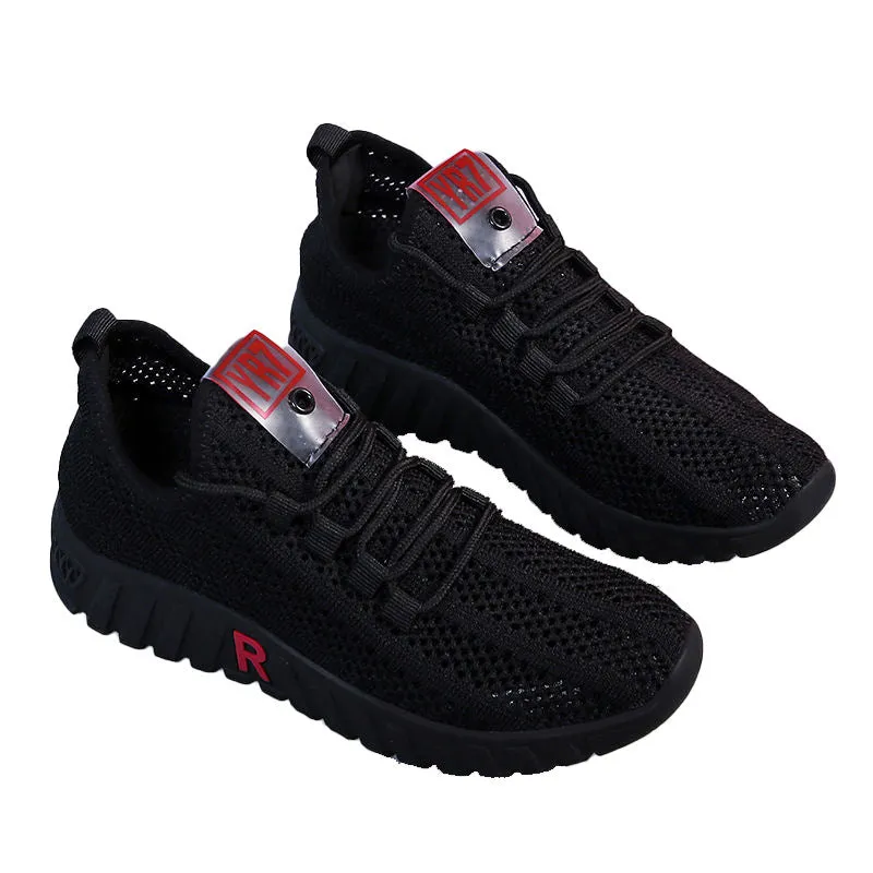 Women's white canvas sports casual shoes with rubber sole, round toe, and low heel, side view