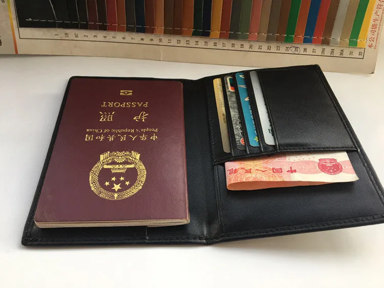 Black RFID antimagnetic passport holder made of genuine leather, open showing card slots and passport slot, 15cm long.