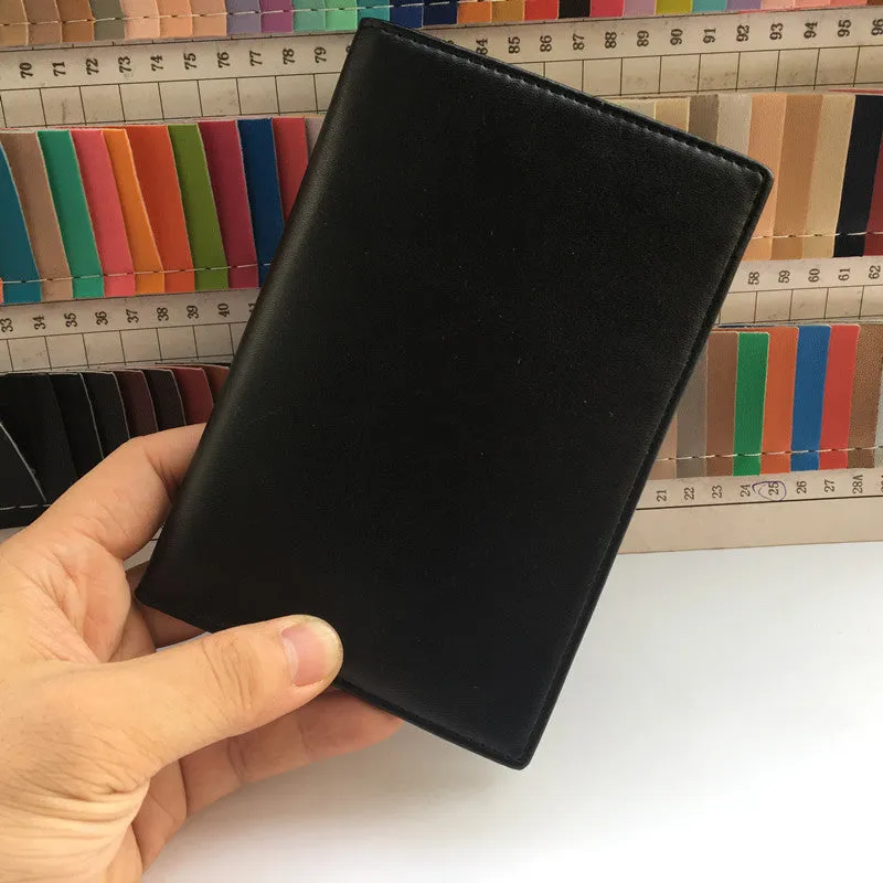 Black RFID antimagnetic passport holder made of genuine leather, open showing card slots and passport slot, 15cm long.
