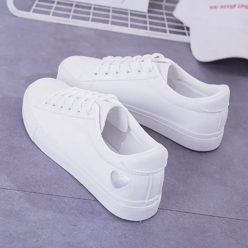 Women's PU leather heart flats shoes with colourful beads and stainless steel pendant on white background